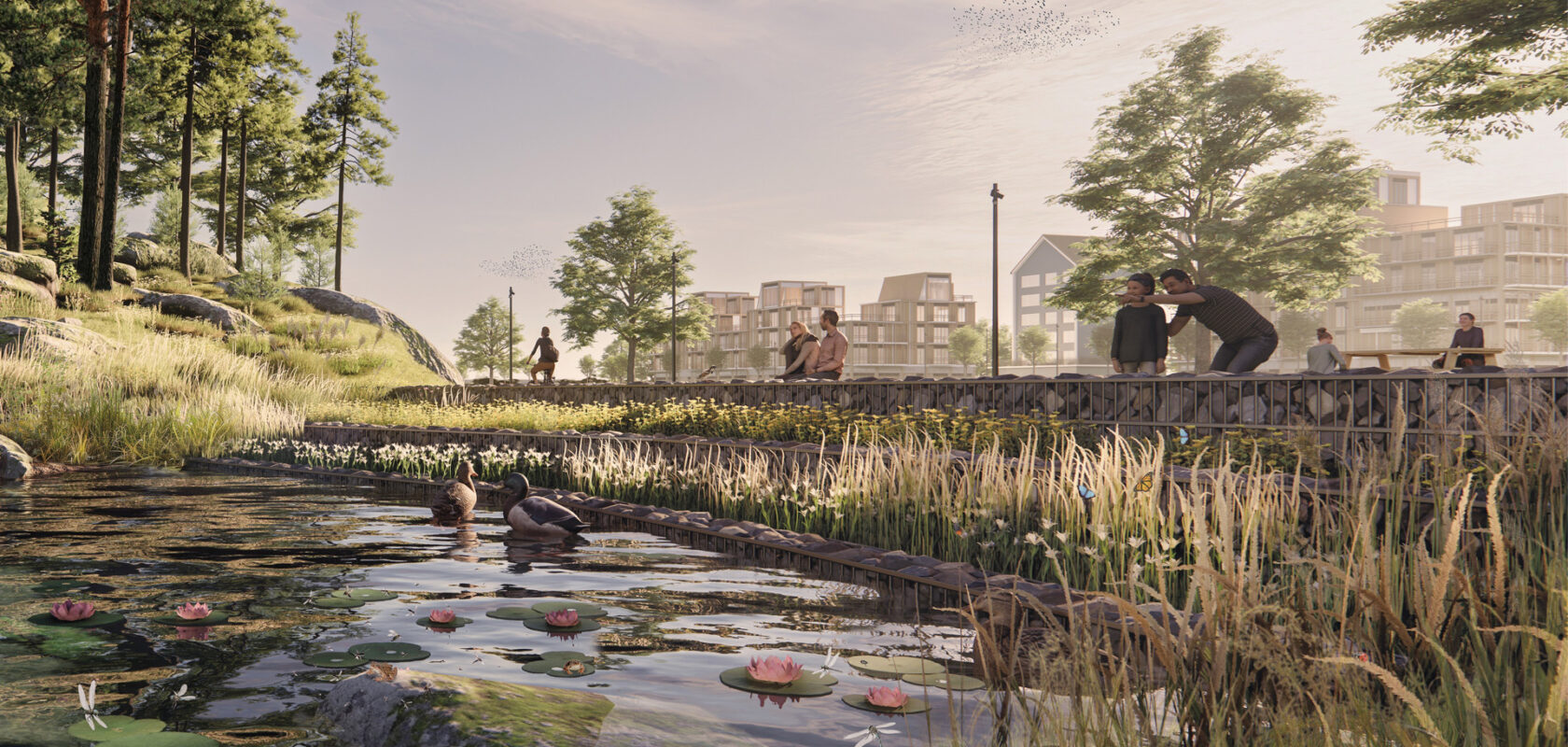 Vijver met eenden en lelie's, omringd door struiken en bomen. Mensen kijken naar het water en in de verte staan er wooncomplexen