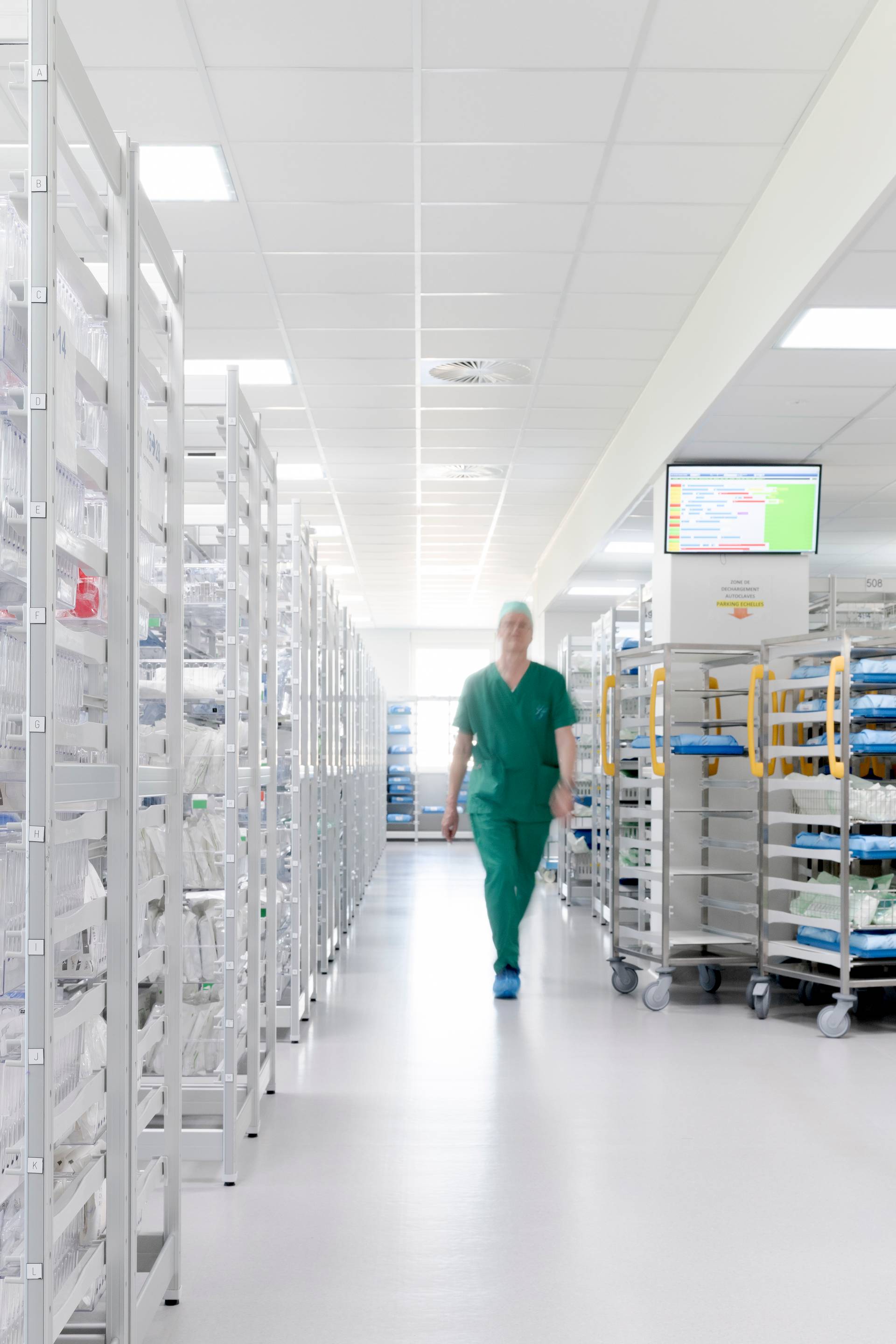 interior photo of the new Grand Hopital de Charleroi hospital, showing the medical storage room with medical staff