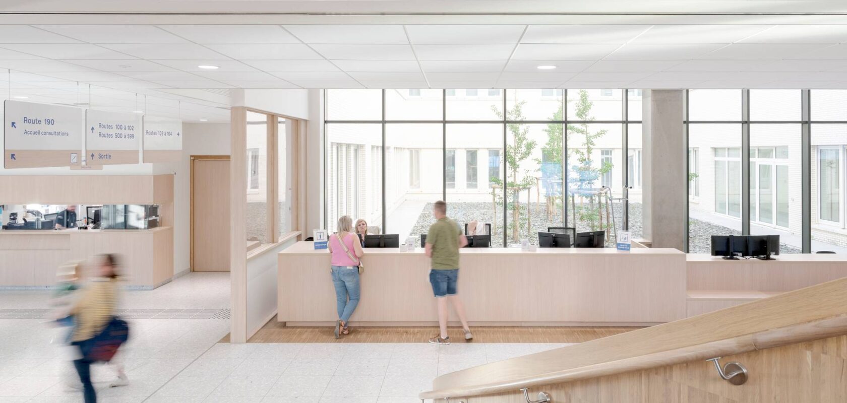 interior photo of the reception desk of the new Grand Hopital de Charleroi hospital, in abundant daylight